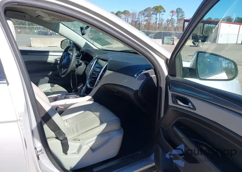 2015 Cadillac Srx Standard z USA, uszkodzony, nr VIN 3GYFNAE3XFS571849